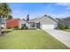 Charming single-story home with a well-manicured lawn and attached two-car garage at 240 Gazania Way, Charleston, SC 29414