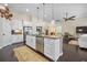 Open kitchen with granite countertops, stainless steel appliances, and an island at 240 Gazania Way, Charleston, SC 29414
