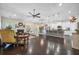 Open-concept living area with kitchen, fireplace and ample seating at 240 Gazania Way, Charleston, SC 29414