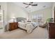 Cozy primary bedroom showcasing vaulted ceiling, natural light, and carpeted floors at 240 Gazania Way, Charleston, SC 29414