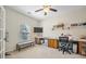 Bright office space with built-in shelves, desk and large window at 240 Gazania Way, Charleston, SC 29414