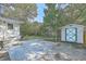 Backyard features a storage shed, mature trees, and room for outdoor entertaining at 2673 Olympia Ave, North Charleston, SC 29405