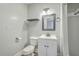 Updated bathroom features single sink vanity, modern mirror, and shower with new fixtures at 2673 Olympia Ave, North Charleston, SC 29405