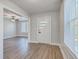 Bright entryway featuring new wood flooring and neutral paint at 2673 Olympia Ave, North Charleston, SC 29405