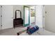 Bedroom with door to deck featuring a dark dresser at 2710 Laroche St, Edisto Beach, SC 29438