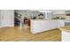Open concept design with bright kitchen, wood countertops, and a seamless transition to the inviting living room at 2710 Laroche St, Edisto Beach, SC 29438