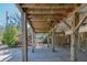 Open under-deck area, has a wood picnic table with bench, as well as an outdoor shower at 2710 Laroche St, Edisto Beach, SC 29438