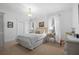 Cozy bedroom features natural light, soft carpet, and ample closet space at 2863 Jasper Blvd, Sullivans Island, SC 29482