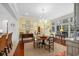 Casual dining area with hardwood floors, neutral decor, and lots of natural light at 2863 Jasper Blvd, Sullivans Island, SC 29482