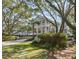 Stunning two-story home with multiple decks and a well-manicured front yard at 2863 Jasper Blvd, Sullivans Island, SC 29482