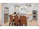 Modern kitchen with stainless steel appliances, wooden island, and white cabinets at 2863 Jasper Blvd, Sullivans Island, SC 29482