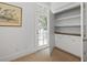 Bright, light-filled room with storage and access to a balcony offering serene outdoor views at 2863 Jasper Blvd, Sullivans Island, SC 29482