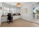Bright office with built-in desk, ample storage, and access to a private balcony at 2863 Jasper Blvd, Sullivans Island, SC 29482