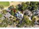 Beautiful aerial view of a modern home with a well-manicured yard surrounded by lush trees at 2928 Baywood Dr, Seabrook Island, SC 29455