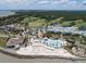 Stunning aerial view of a coastal resort with a beach, pools, and golf course for leisure and relaxation at 2928 Baywood Dr, Seabrook Island, SC 29455