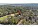 Aerial view of a neighborhood with manicured golf courses in a marshland community at 2928 Baywood Dr, Seabrook Island, SC 29455