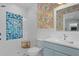 Stylish bathroom with walk in shower and fun, colorful wallpaper at 2928 Baywood Dr, Seabrook Island, SC 29455