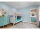 Fun bedroom with bunkbeds, colorful decor and an en suite bathroom at 2928 Baywood Dr, Seabrook Island, SC 29455