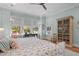 Comfortable bedroom featuring hardwood floors, a desk, and an attractive armoire at 2928 Baywood Dr, Seabrook Island, SC 29455