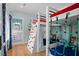 Nautical themed bedroom with unique bunkbeds, climbing wall and access to an ensuite bathroom at 2928 Baywood Dr, Seabrook Island, SC 29455