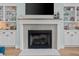 Close-up of the fireplace with a decorative mantle and built-in shelving, a cozy focal point in the living room at 2928 Baywood Dr, Seabrook Island, SC 29455