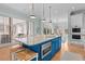 Spacious kitchen island with seating, a sink, and modern appliances, perfect for food preparation and entertaining at 2928 Baywood Dr, Seabrook Island, SC 29455