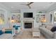 Beautiful living room with a fireplace, built-in shelving, and comfortable seating arrangement at 2928 Baywood Dr, Seabrook Island, SC 29455
