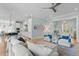Bright and airy living space featuring hardwood floors, an open layout, and seamless flow to the kitchen at 2928 Baywood Dr, Seabrook Island, SC 29455