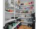 Spacious walk-in pantry with adjustable white shelves and ample storage space for food and kitchen essentials at 2928 Baywood Dr, Seabrook Island, SC 29455