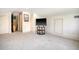 Spacious attic featuring neutral carpet, a wall mounted TV, and ample natural light at 299 Hobcaw Dr, Mount Pleasant, SC 29464