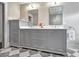 Bathroom with marble countertop, double sinks and vanity with built-in storage at 299 Hobcaw Dr, Mount Pleasant, SC 29464