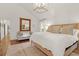 Serene bedroom with a king bed, soft lighting, a decorative rug, and a cozy seating area at 299 Hobcaw Dr, Mount Pleasant, SC 29464