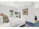 Bedroom featuring white walls, a ceiling fan, and a large window providing natural light at 299 Hobcaw Dr, Mount Pleasant, SC 29464