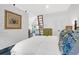Bedroom features white walls, a ladder to the loft, and unique decor at 299 Hobcaw Dr, Mount Pleasant, SC 29464