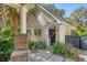 Quaint backhouse with charming architectural details and a cozy outdoor seating area at 299 Hobcaw Dr, Mount Pleasant, SC 29464