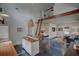 Lofted living area with a ladder to the loft, and a view to the bed and a comfy living space at 299 Hobcaw Dr, Mount Pleasant, SC 29464