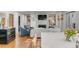 Inviting living room with a fireplace, built-in shelves, comfortable seating, and hardwood floors at 299 Hobcaw Dr, Mount Pleasant, SC 29464