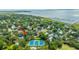 Aerial neighborhood view with a neighborhood tennis court, close to the harbor, and beaches at 313 Queen St, Mount Pleasant, SC 29464