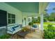 Inviting front porch featuring comfortable seating, perfect for enjoying the outdoors at 313 Queen St, Mount Pleasant, SC 29464