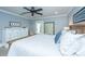 Cozy bedroom with stylish furnishings and plenty of natural light from the door to the exterior at 313 Queen St, Mount Pleasant, SC 29464