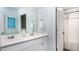 Bright bathroom features double sinks with white cabinetry and coordinated decor at 321 Pine Crest View Dr, Summerville, SC 29486