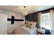 Charming bedroom features a subtle color palette, wood accents, and natural light at 321 Pine Crest View Dr, Summerville, SC 29486