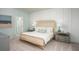 Serene main bedroom with a decorative headboard, and soft carpeting at 321 Pine Crest View Dr, Summerville, SC 29486