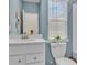Comfortable bathroom with a white sink, a toilet, and natural light at 334 Pine Crest View Dr, Summerville, SC 29486