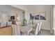 Elegant dining room featuring modern decor, wood flooring, and lots of natural light at 334 Pine Crest View Dr, Summerville, SC 29486