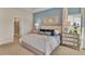 Spacious main bedroom featuring a king-sized bed, dual dressers, and ensuite bathroom access at 334 Pine Crest View Dr, Summerville, SC 29486