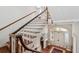 Grand foyer featuring hardwood floors, staircase, and chandelier at 38 State St # 2, Charleston, SC 29401