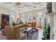 Spacious living room with high ceilings, fireplace, comfortable seating, and natural light from large windows at 38 State St # 2, Charleston, SC 29401