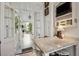 Bright breakfast nook with access to a covered porch at 38 State St # 2, Charleston, SC 29401