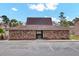 Well-maintained clubhouse exterior with parking, offering a central gathering space for residents at 402 Andrea Ln, Hanahan, SC 29410